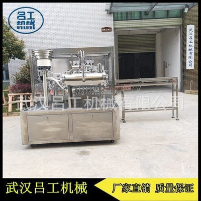 灌裝旋蓋機吸嘴袋葡萄汁全自動灌裝旋蓋一體機設(shè)備
